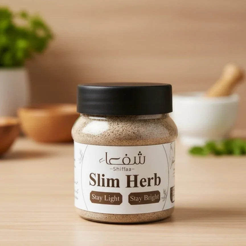 Theshiffaa Slim Herb powder jar on wooden table with herbs and kitchenware in background.